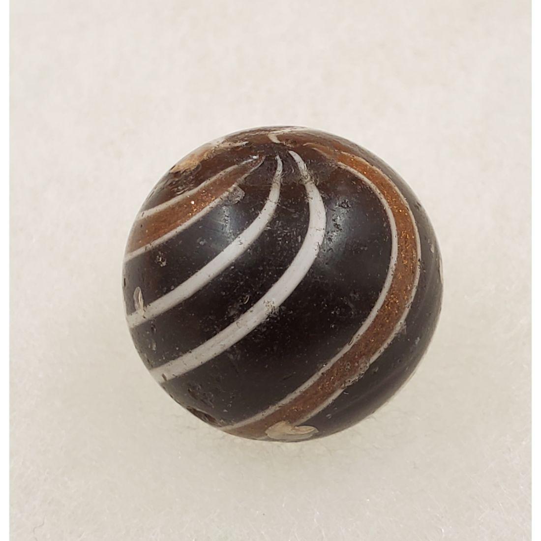 Marble: Banded Lutz Handmade on Dark Ground w/ 4 Banded Swirls, 20.1 mm: Marble: Banded Lutz Handmade on Dark Ground w/ 4 Banded Swirls, 20.1 mm, Two Lutz, Two White. Piece appears to be a black Indian Lutz marble which would be opaque. However when held to a bright light,
