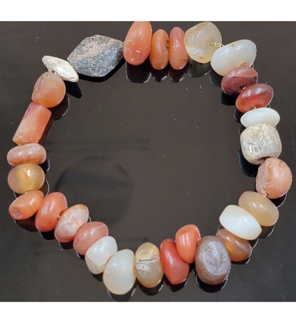 A String Of Antique Agate And Carnelian Beads: A String Of Antique Agate And Carnelian Beads, Various Sizes. This, and many lots forthcoming were found at the massive central Florida estate of a true antiquarian who amassed his magnificent collect
