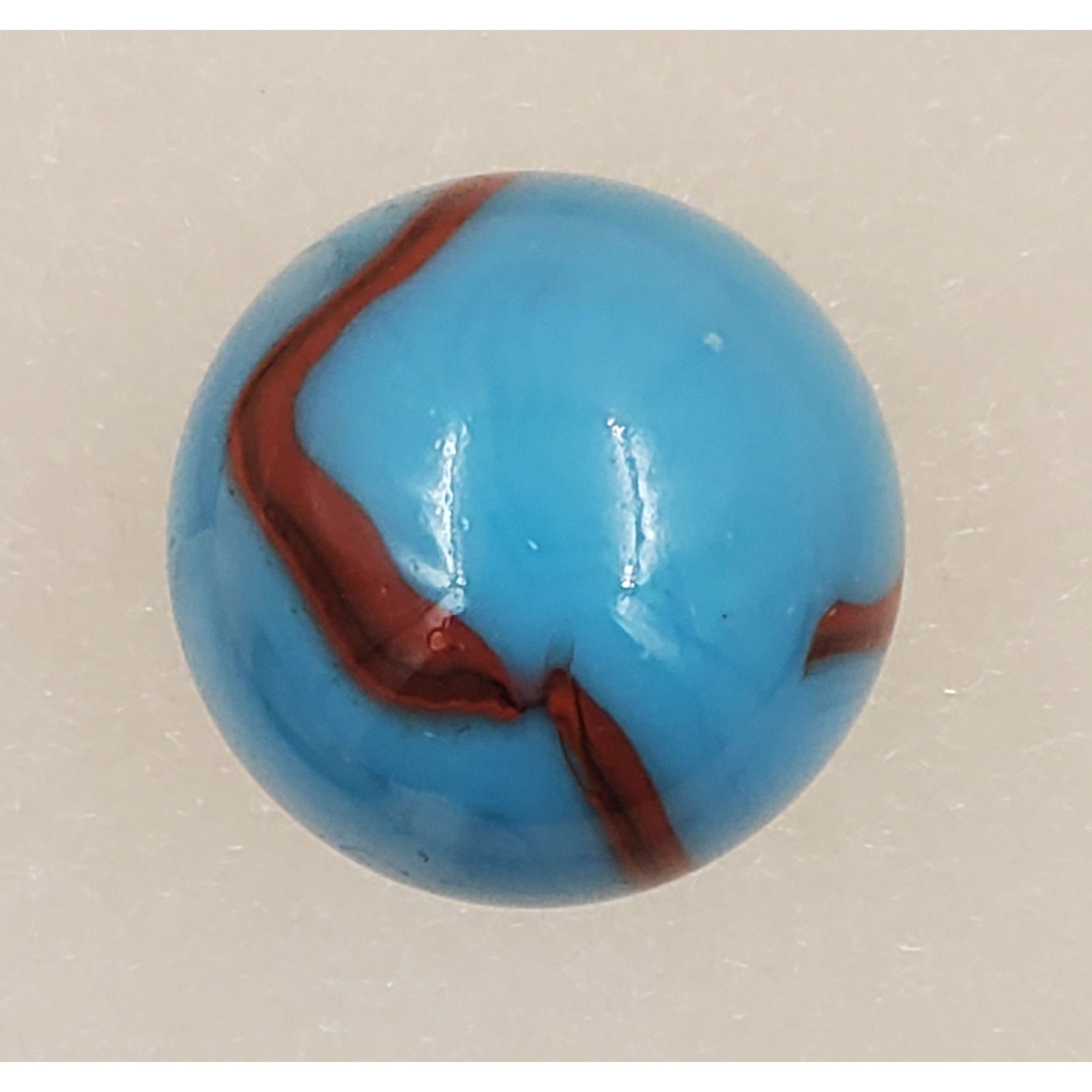 Lg Blue and Ox Blood Marble, 40.2mm: Lg Blue and Ox Blood Marble, 40.2mm. Please carefully read our terms of sale, shipping information, and request any condition reports or photos prior to placing a bid. Any condition statement is given