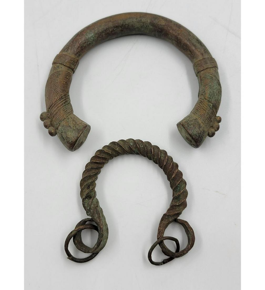 Lot Of 2 Antique African Bronze Currency Bracelets: Lot Of 2 Antique African Bronze Currency Bracelets. This, and many lots forthcoming were found at the massive central Florida estate of a true antiquarian who amassed his magnificent collection over a