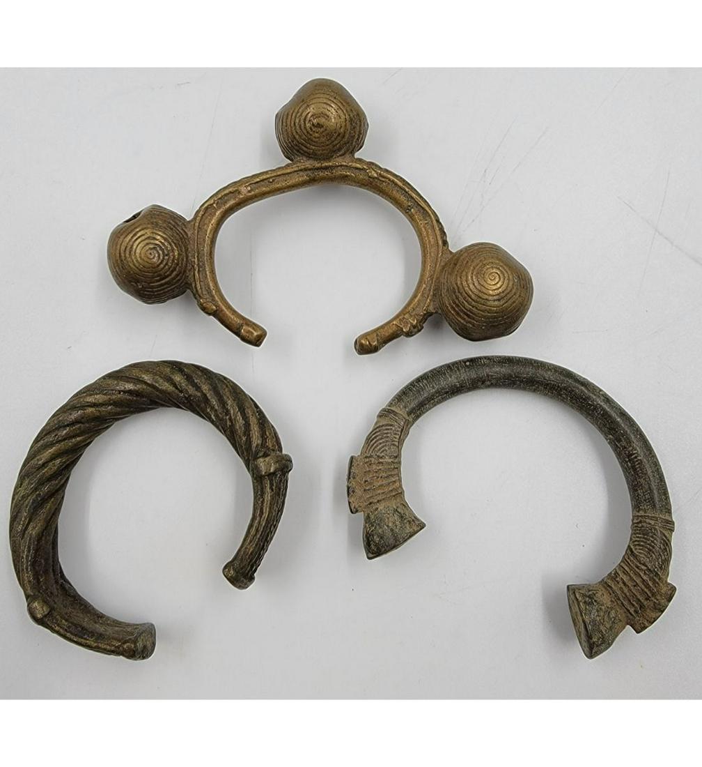 Lot Of 3 Antique African Bronze Currency Bracelets: Lot Of 3 Antique African Bronze Currency Bracelets. This, and many lots forthcoming were found at the massive central Florida estate of a true antiquarian who amassed his magnificent collection over a