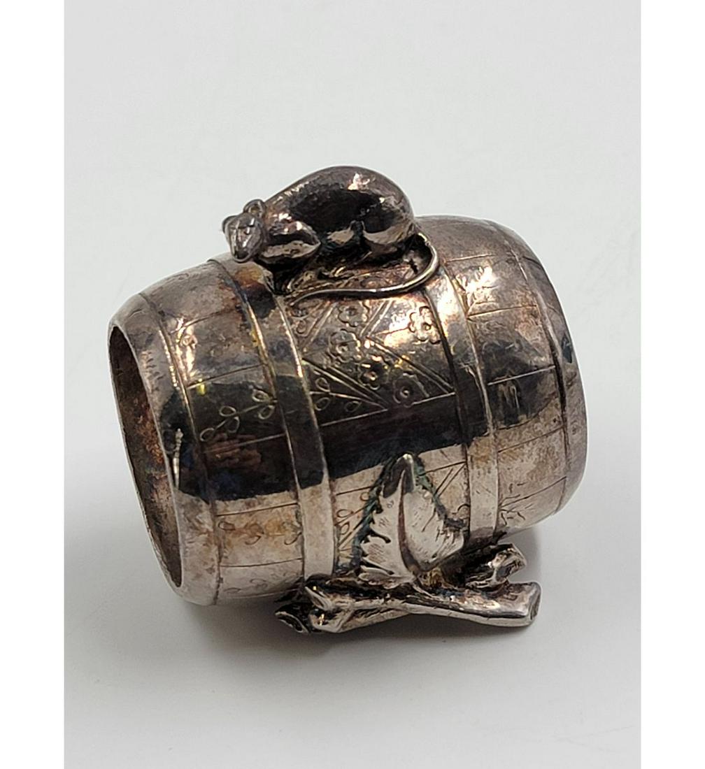 Vintage Silverplate Figural Napkin Ring: Vintage Silverplate Figural Napkin Ring. Measure 2 1/4" Tall. Please carefully read our terms of sale, shipping information, and request any condition reports or photos prior to placing a bid. Any con