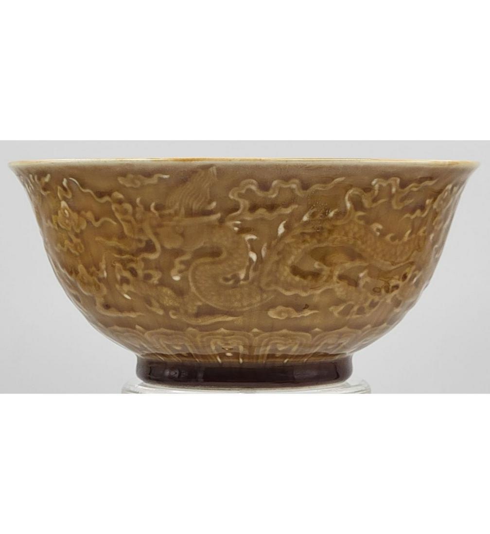 A Chinese Porcelain Bowl With Mark Decorated With Dragons: A Chinese Porcelain Bowl With Mark Decorated With Dragons. Measure 8 1/4" X 4". Please carefully read our terms of sale, shipping information, and request any condition reports or photos prior to plac