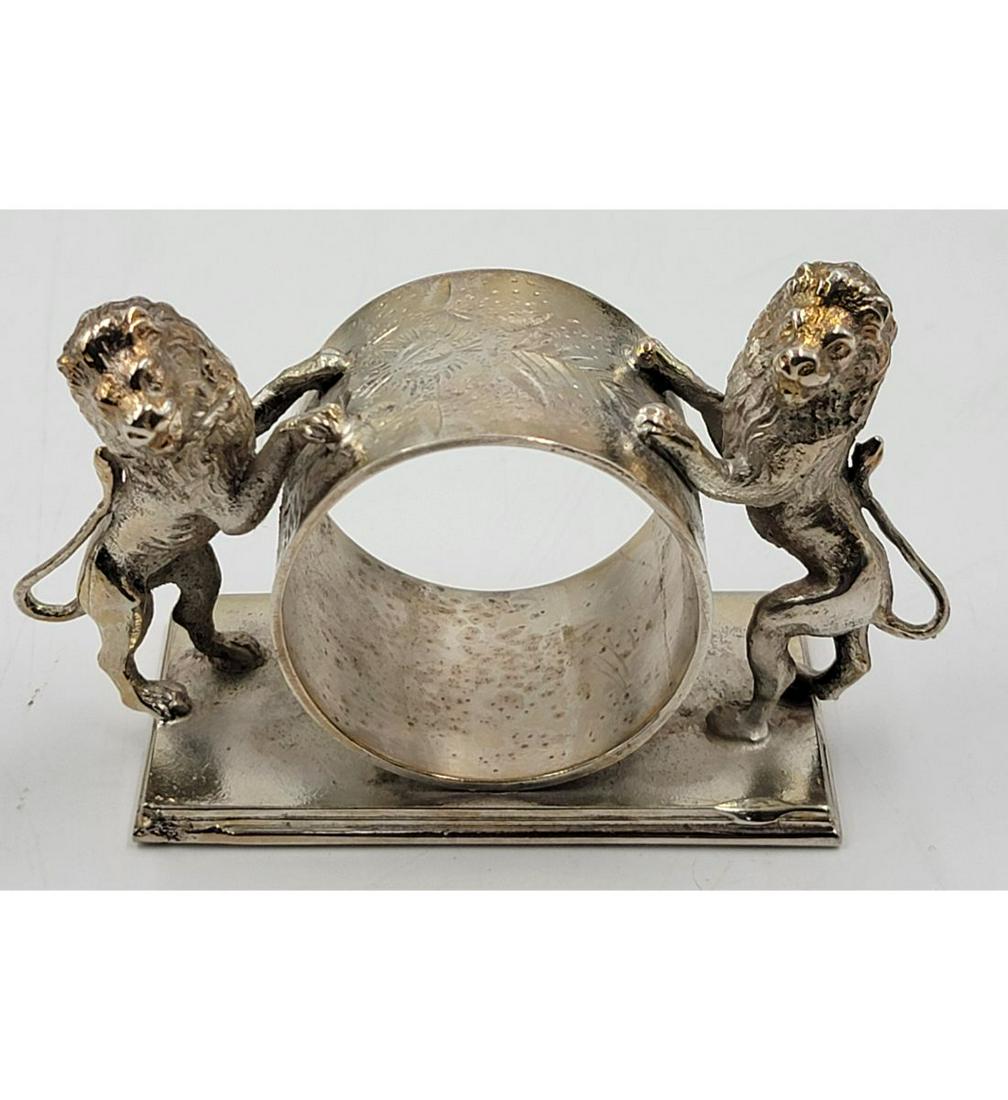 Vintage Silverplate Figural Napkin Ring: Vintage Silverplate Figural Napkin Ring. Measure 2 1/4" Tall. Please carefully read our terms of sale, shipping information, and request any condition reports or photos prior to placing a bid. Any con