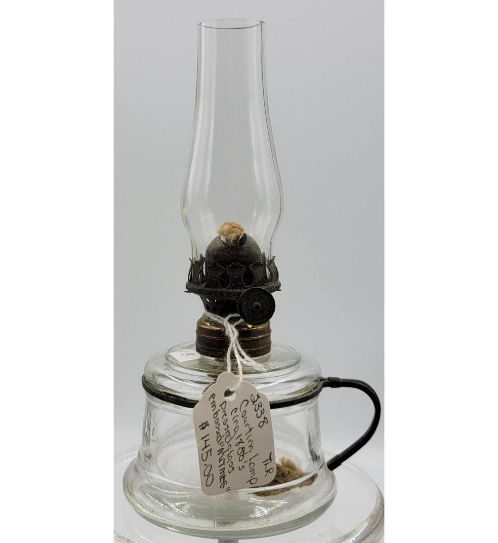 Miniature Oil Lamp Embossed "NUTMEG" (0305) on Dec 10, 2022