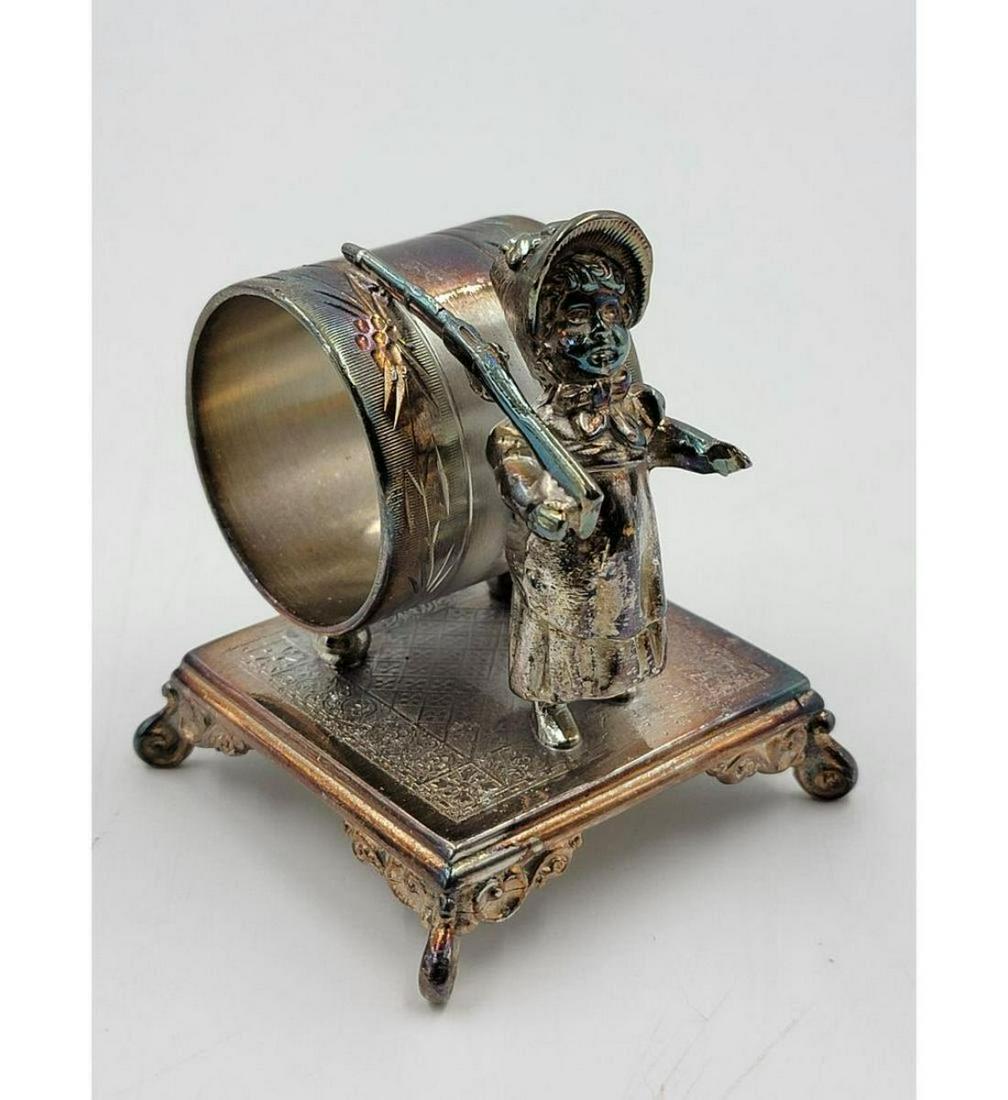 Vintage Silverplate Figural Napkin Ring: Vintage Silverplate Figural Napkin Ring. Measure 3.5" Tall. Please carefully read our terms of sale, shipping information, and request any condition reports or photos prior to placing a bid. Any condi
