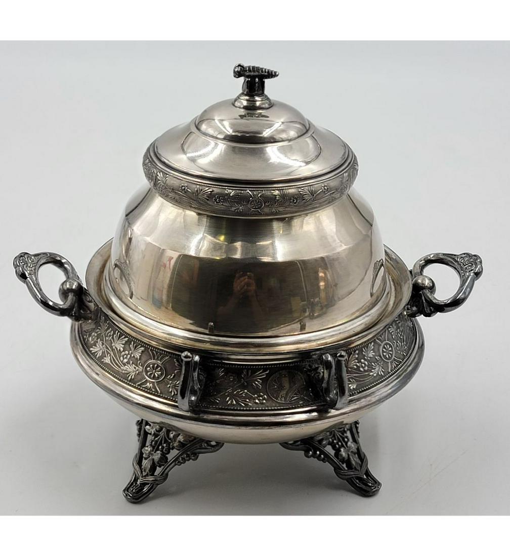 A Silverplate Butter Dish W.M Rogers: A Silverplate Butter Dish. Measures 8.5" X 7.5". Please carefully read our terms of sale, shipping information, and request any condition reports or photos prior to placing a bid. Any condition statem