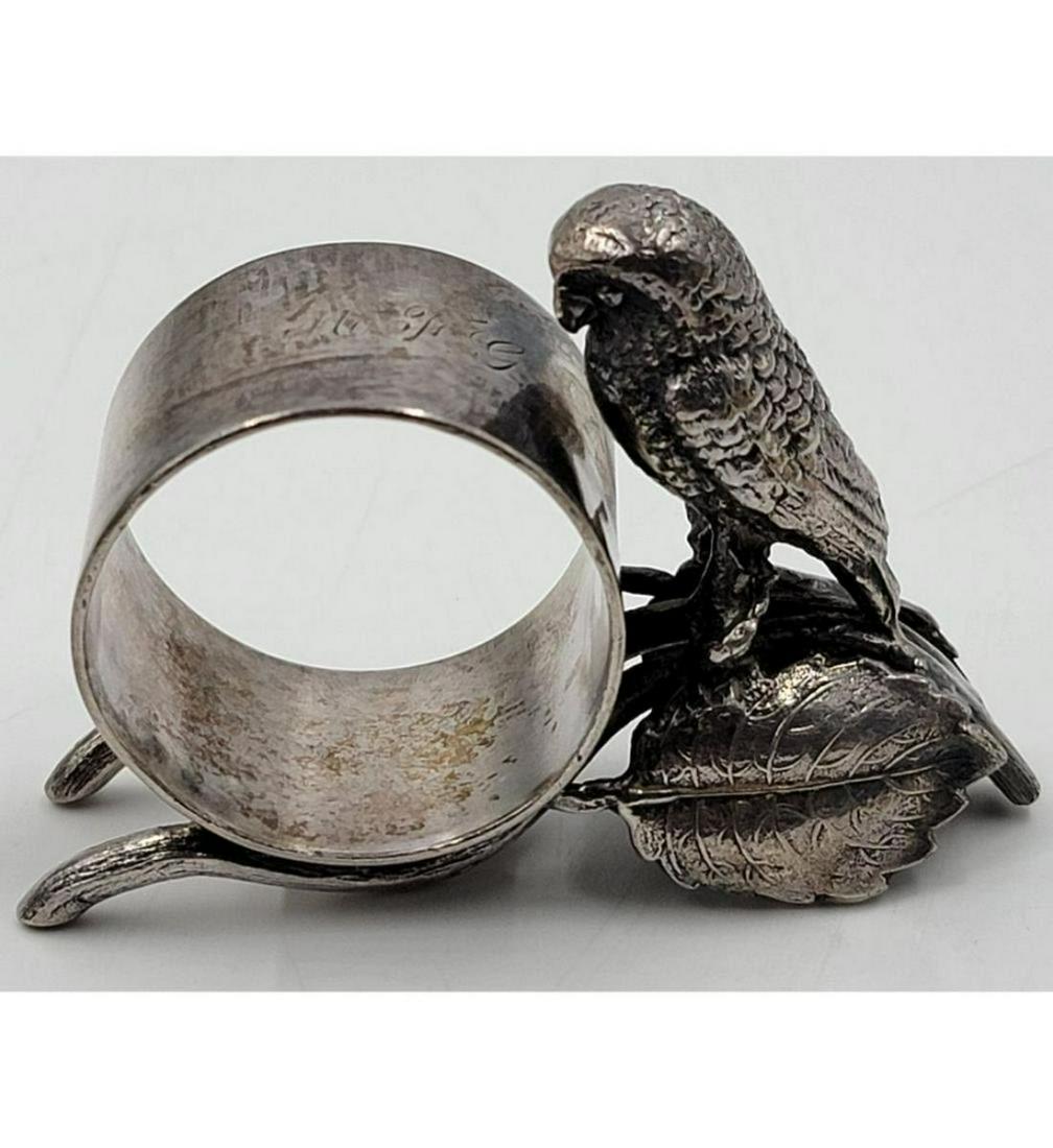 Vintage Silverplate Figural Napkin Ring: Vintage Silverplate Figural Napkin Ring. Measure 2.5" Tall. Please carefully read our terms of sale, shipping information, and request any condition reports or photos prior to placing a bid. Any condi