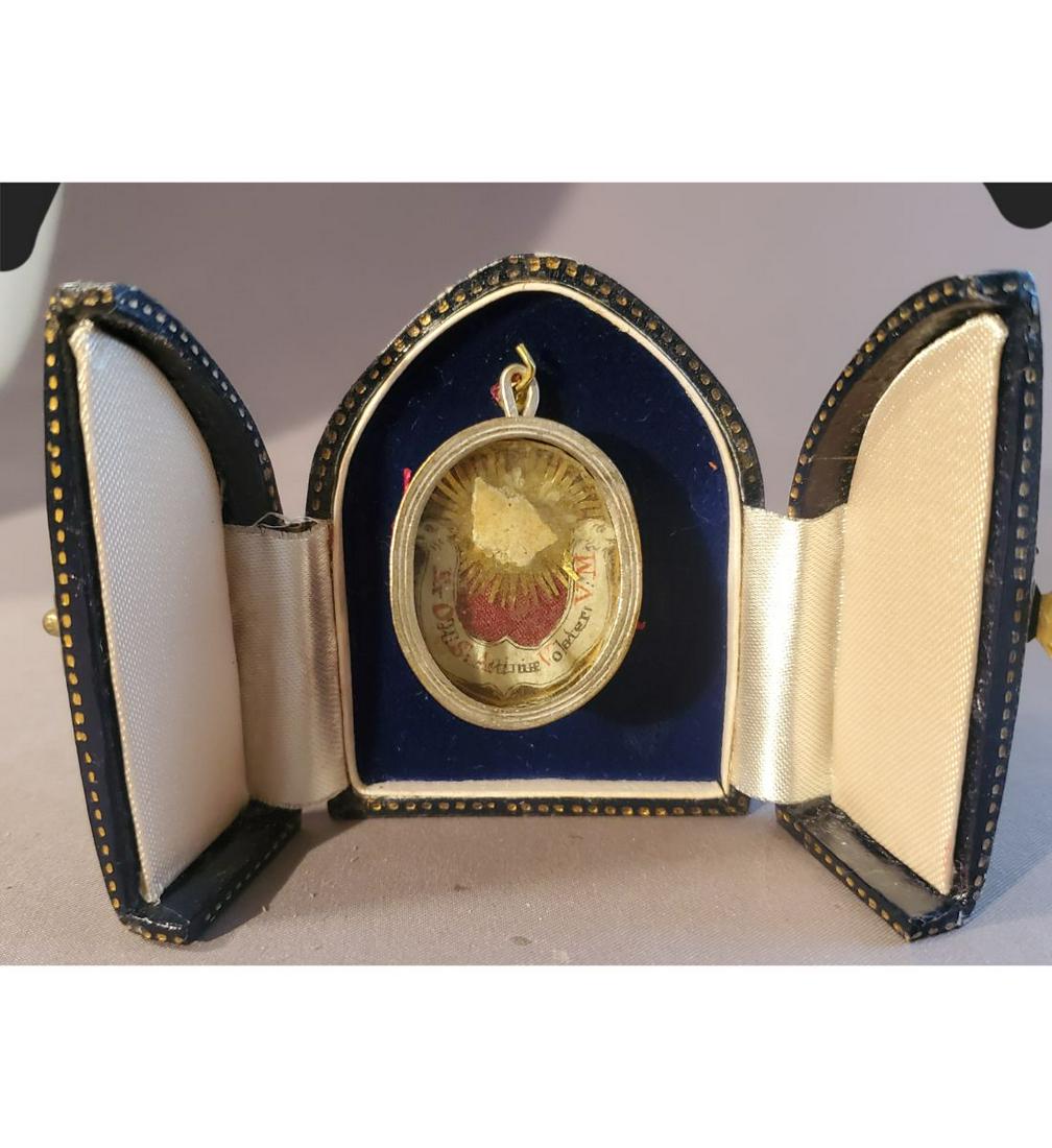 1st class relic of Saint Aeriniae Volate, Virgin and Martyr. Ex. Ossibus: 1st class relic of Saint Aeriniae Volate, Virgin and Martyr. Ex. Ossibus (large piece of bone ). The relic is contained in a large oval silver theca with intricate work to the interior. This relic is 