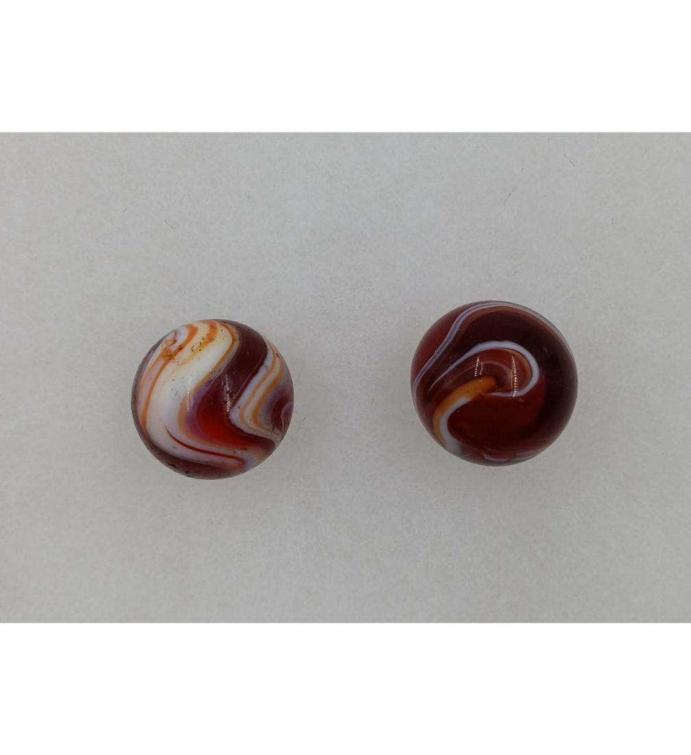 Pair Of Christensen Agate Large Bloodies: Pair Of Christensen Agate Large Bloodies. See Pics for Size. Please carefully read our terms of sale, shipping information, and request any condition reports or photos prior to placing a bid. Any cond