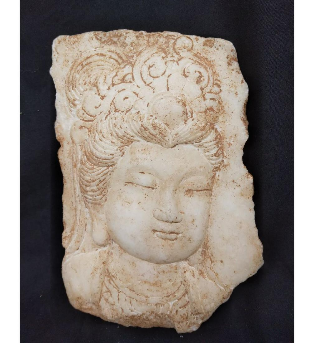 A Chinese Stone Fragment Kwan Yin Age Unknown: A Chinese Stone Fragment Kwan Yin. Measure 17.5 X 12.5 CM. Please carefully read our terms of sale, shipping information, and request any condition reports or photos prior to placing a bid. Any condit