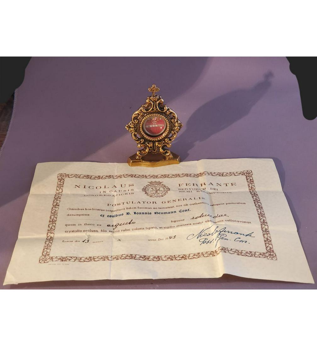 1st Class Relic With Authentication Document Of Bl. John Neumann: 1st class relic with authentication document of Bl. John Neumann. The relic is ex. Ossibus (bone), and housed in fancy Gothic reliquary standing 3" tall. A wonderful catholic religious treasure.. Plea
