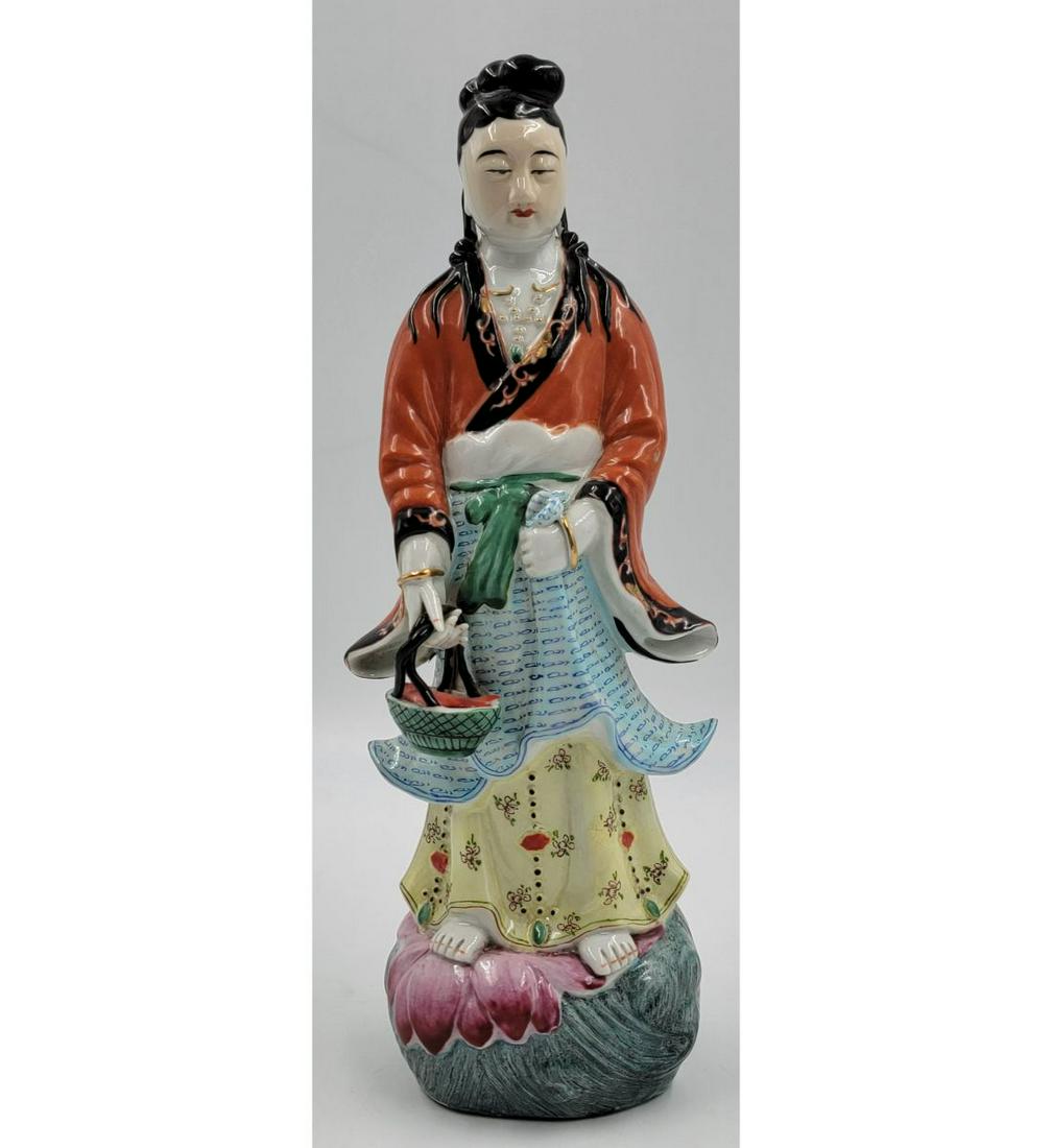 A Chinese Famille Rose Figure Kwan Yin 1900-1920: A Chinese Famille Rose Figure Kwan Yin 1900-1920. Measure 13 1/4". Please carefully read our terms of sale, shipping information, and request any condition reports or photos prior to placing a bid. An