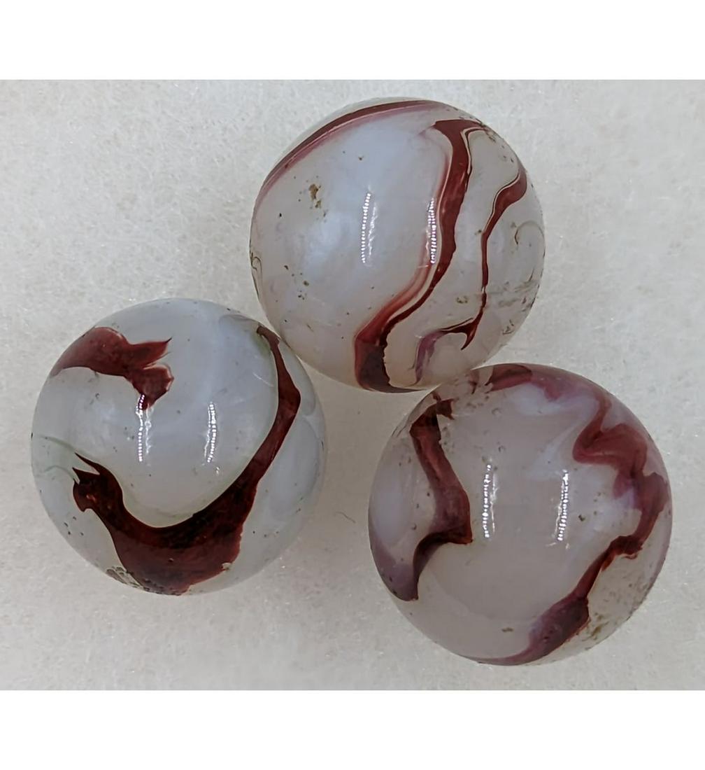 Marbles: Lot Of 3 Silver Oxbloods: Marbles: Lot Of 3 Silver Oxbloods. See pics for size. Please carefully read our terms of sale, shipping information, and request any condition reports or photos prior to placing a bid. Any condition s