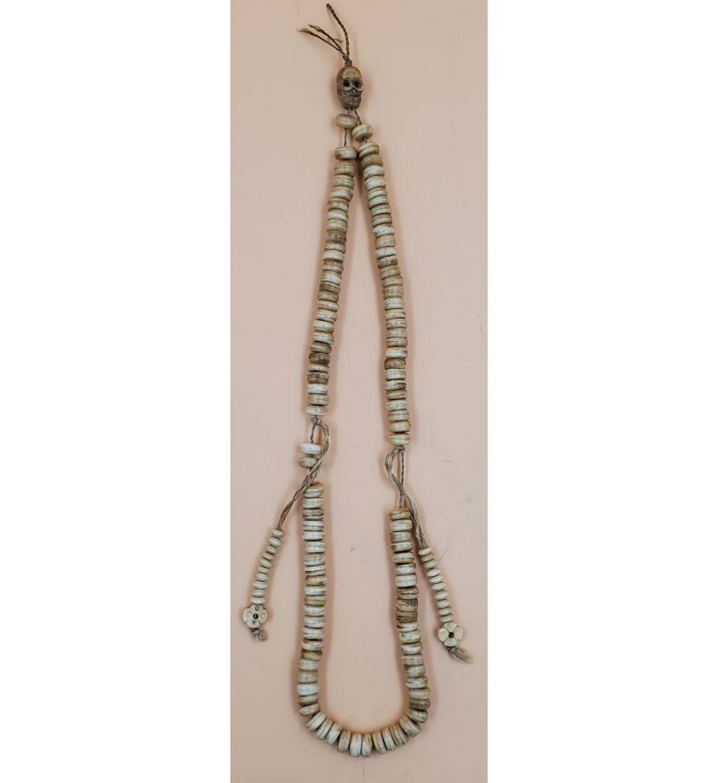 A Tibetan Bone Buddhist Mala Bead Necklace: A Tibetan Bone Buddhist Mala Bead Necklace. Measures 15" long. Please carefully read our terms of sale, shipping information, and request any condition reports or photos prior to placing a bid. Any co