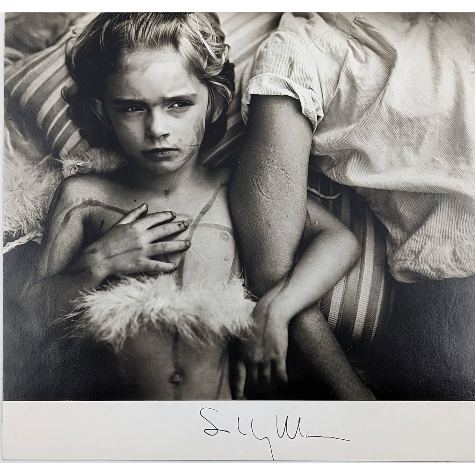 Sally Mann - "Jessie Bites" Pen-Signed Print: Sally Mann - "Jessie Bites" Pen-Signed Print. Measures approx. 9 1/4" X 10". Please carefully read our terms of sale, shipping information, and request any condition reports or photos prior to placing