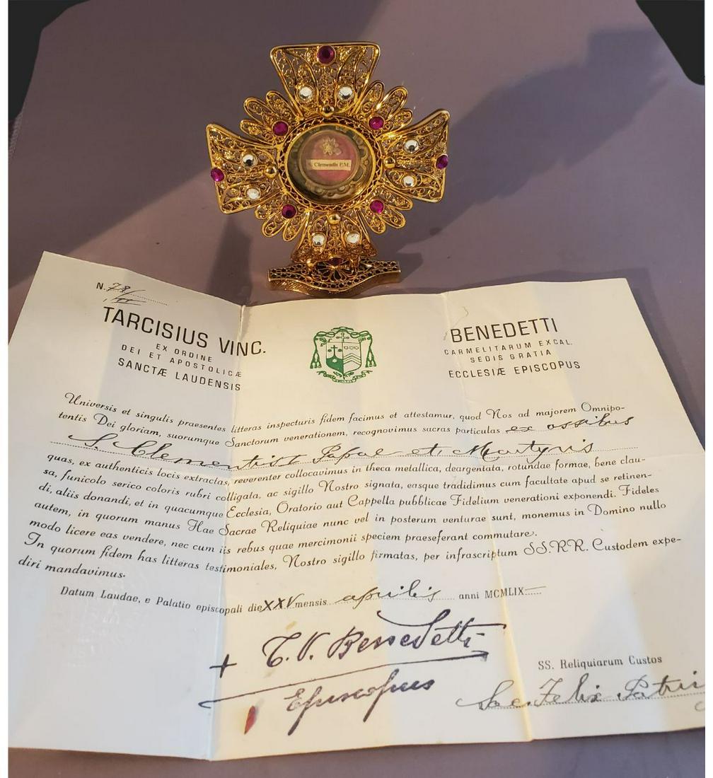 1st Class Relic Of Saint Clementis, Pope and Martyr, ex. Ossibus (bone) With Authentication Document: RE-LISTED TO COVER NON PAYMENT OF FEES-1st class relic of Saint Clementis, Pope and Martyr, ex. Ossibus (bone) with authentication document. The relic is contained in a fancy brass theca. The theca is