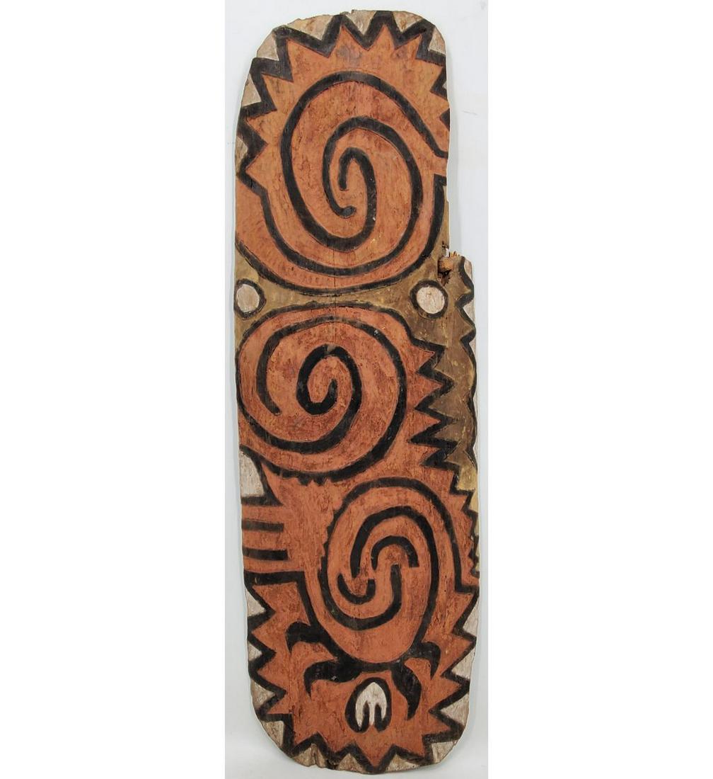 Polynesian Style Shield: Polynesian Style Shield Measures 53" x 17". There is a chunk missing from the top left of the shield. Please carefully read our terms of sale, shipping information, and request any condition reports o