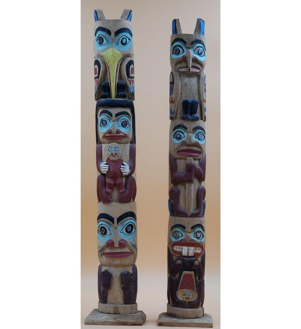 Pair of Pacific Northwest Miniature Totem Poles: Pair of Pacific Northwest Miniature Totem Poles. Measures 26 5/8" & 26" tall. Please carefully read our terms of sale, shipping information, and request any condition reports or photos prior to placin