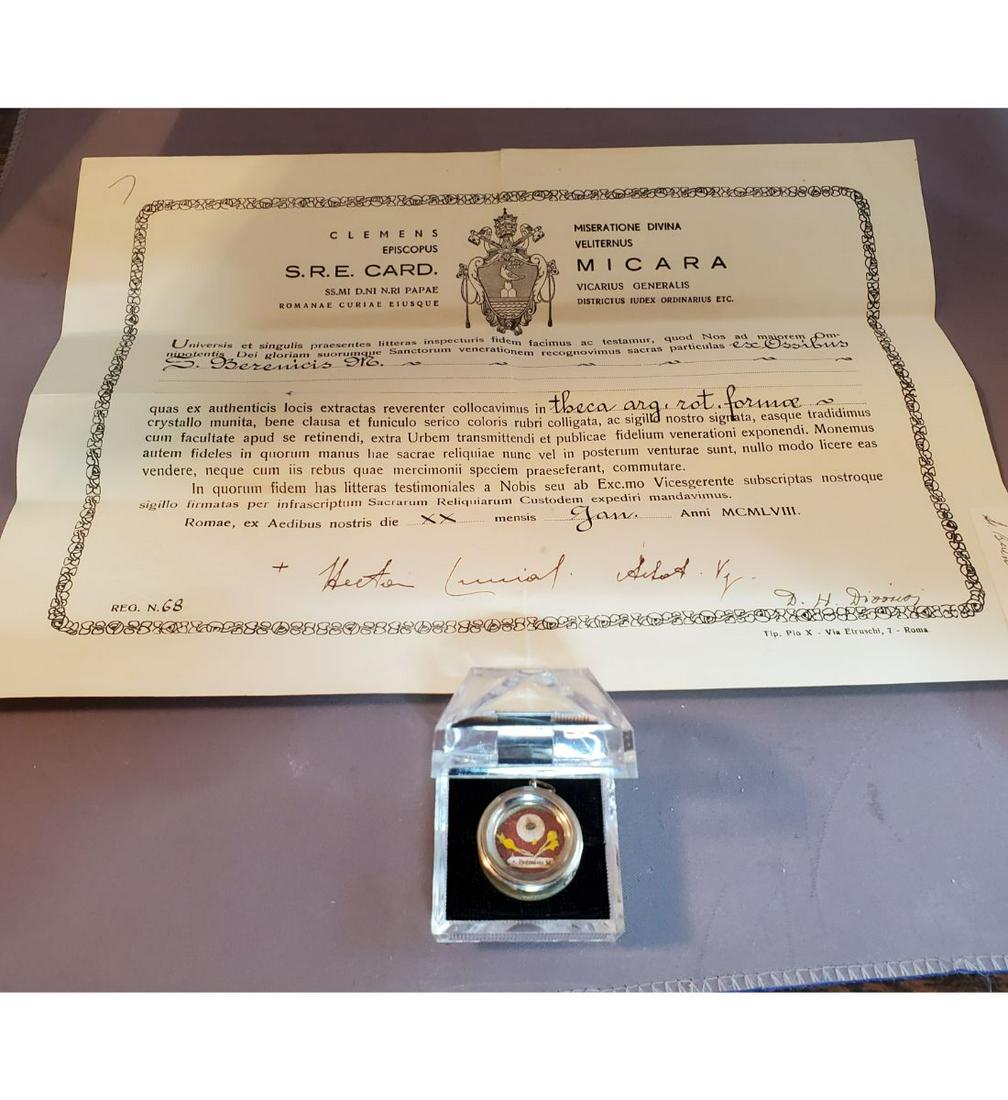 1st Class Relic Of Saint Bernice, ex. Ossibus (bone) With Authentication Document Dated 1958: 1st Class Relic Of Saint Bernice, ex. Ossibus (bone) With Authentication Document Dated 1958. The relic is housed in a silver round theca. The theca is housed in this Gothic type presentation case. Sa
