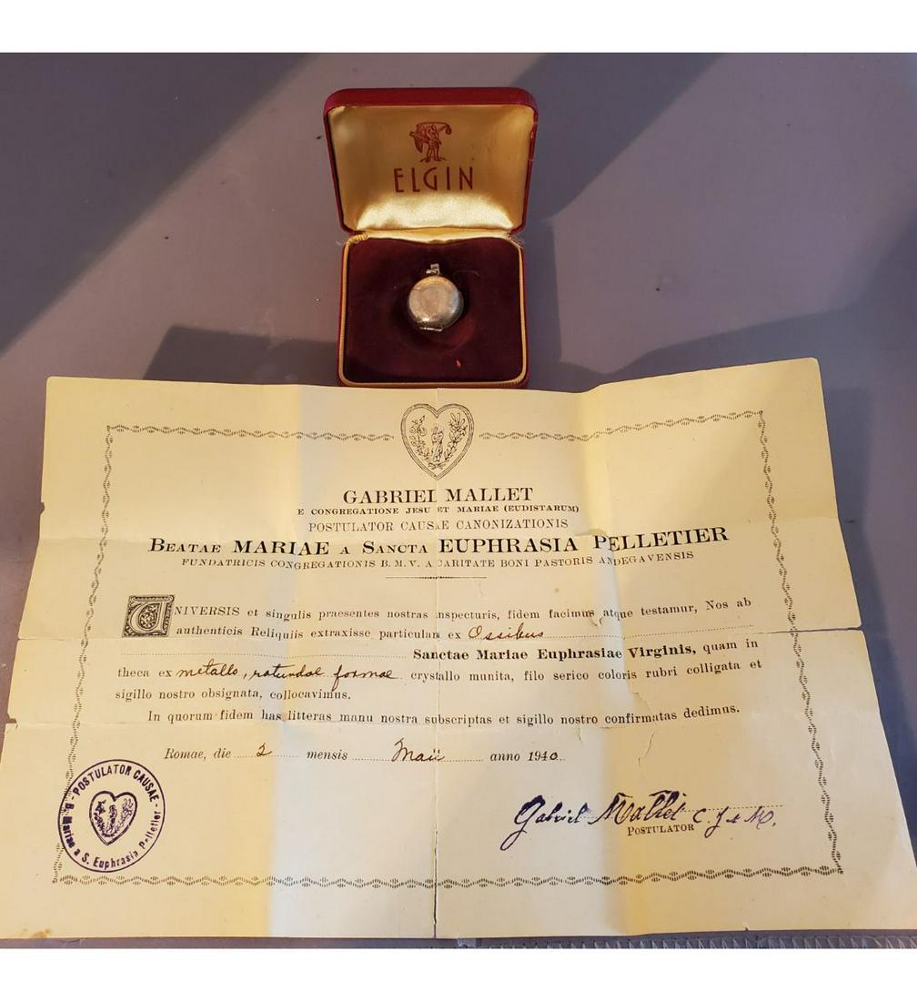 1st Class Relic With Authentication Document Dated 1940 Of Saint Mariae Euphrasia Pelletier: 1st Class Relic With Authentication Document Dated 1940 Of Saint Mariae Euphrasia Pelletier. The relic is ex. Ossibus (bone), and housed in a silver locket. The silver locket is nice and small and how