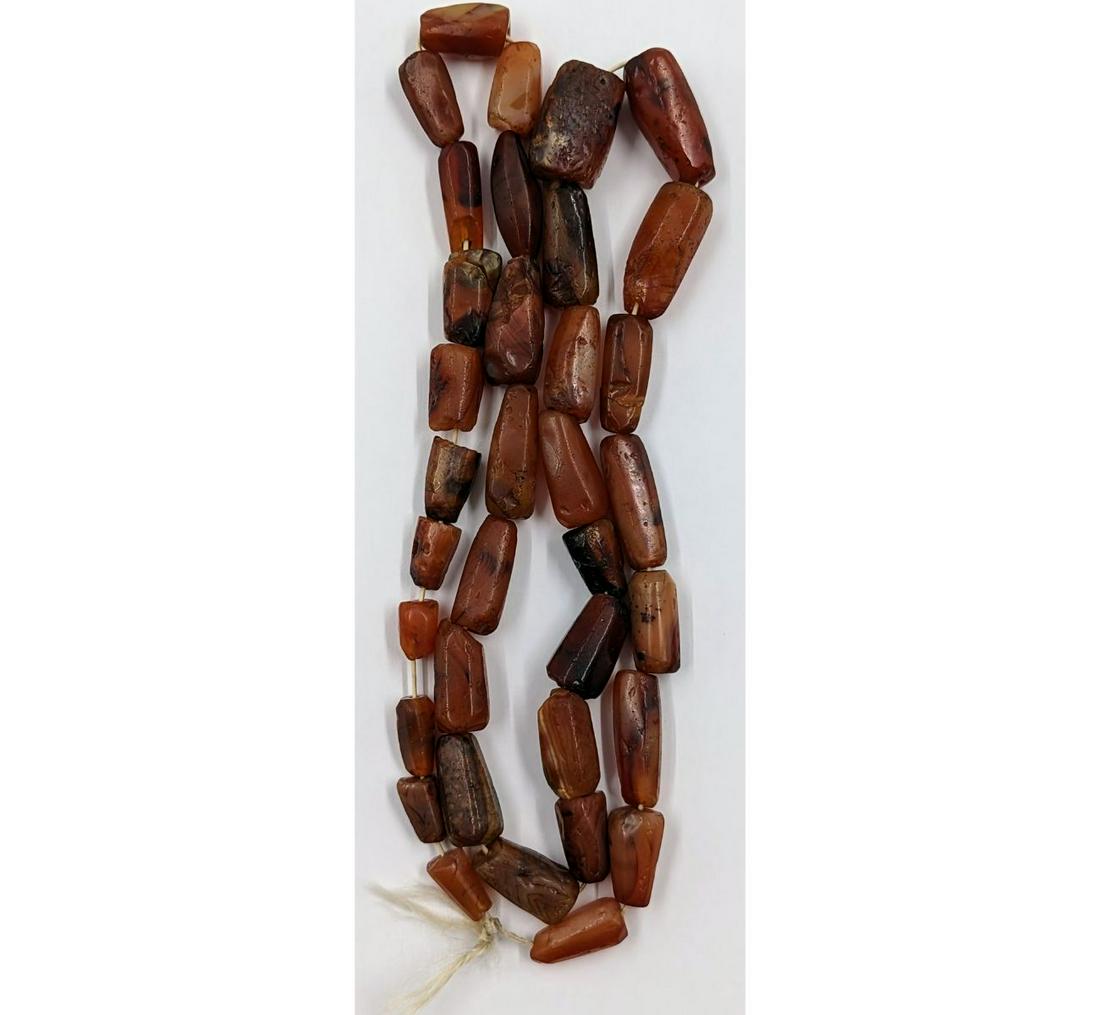 Antique Chinese Carnelian Bead Necklace, 35 Beads: Antique Chinese Carnelian Bead Necklace, 35 Beads. Measures approx. 17" folded, 34" total. Please carefully read our terms of sale, shipping information, and request any condition reports or photos pr
