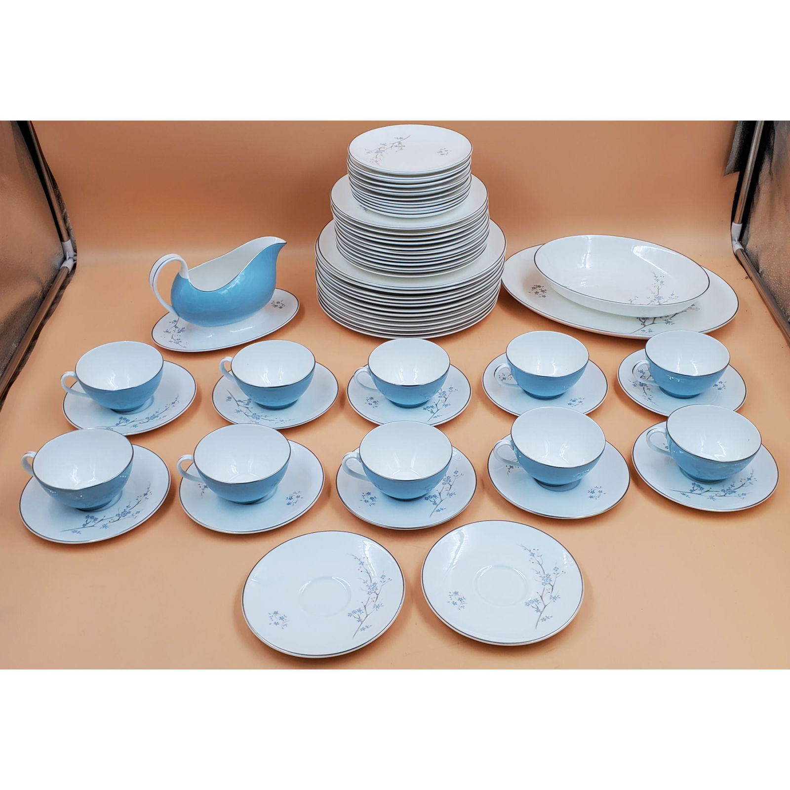 Royal Doulton Summer Song Dinnerware Service: Partial Royal Doulton Summer Song Dinnerware Service. There are a total of 60 Pieces. There are 12 Plates, 12 Appetizer Plates, 11 small plates, 10 Tea cup, 12 Teacup plates, and two different sized s
