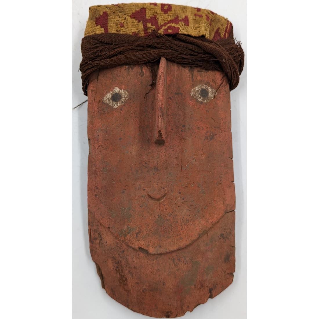 A Pre-Contact Peruvian Mummy Mask W/ Headband, Pigmented With Red Cinnabar (1 of 8)
