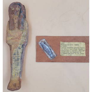 A Large Egyptian Polychrome & a Limestone Ushabti, From the Collection of William Ashby: A Large Egyptian Polychrome & a Limestone Ushabti, From the Collection of William Ashby. The larger one measures 2 1/4" x 11/2" x 9", and the Limestone one measures 5 7/8" x 3" x 1/4". Please