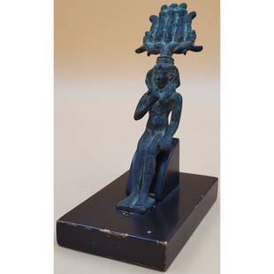 Egyptian Bronze Harpocrates Figure on Stand, From the Collection of William Ashby: Egyptian Ushabti Burlel Faience, Ptolemaic Period. From the Collection of William Ashby. The figure itself measures 1 3/4" x 1 1/2" x 7 3/4" and the stand measures 5 3/8" x 3 1/2" x 2 3/4". Please