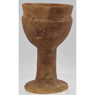 An Early Egyptian Carved Alabaster Chalice, From the Collection of William Ashby: An Early Egyptian Carved Alabaster Chalice. Measures approx. 5 1/4" tall. From the Collection of William Ashby. Please carefully read our terms of sale, shipping information, and request any