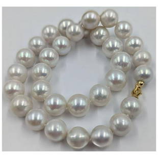 A Fine South Sea Pearl Necklace 54 Grams, 12 To 14.1MM, 32 Pearls With Gold Clasp: A Fine South Sea Pearl Necklace 54 Grams, 12 To 14.1MM, 32 Pearls With Gold Clasp. Measures approx. 17 1/2" long unclasped. || Please carefully read our terms of sale, shipping information, and