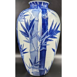 Japanese Blue And White Fukagawa Porcelain Vase With Bamboo Design And Marking: Japanese Blue And White Fukagawa Porcelain Vase With Bamboo Design And Marking. Measures approx. 14 1/2" tall. || Please carefully read our terms of sale, shipping information, and request any