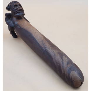 Lignum Vitae Anthropic Effigy with Exaggerated Phallus, Dominican Republic: Lignum Vitae Anthropic Effigy with Exaggerated Phallus, Dominican Republic. Measures 13 5/8" x 2 3/4" x 4 3/4". Provenance: Larry Roberts, author of Taino Sculpture: "Art of the Gods." Please