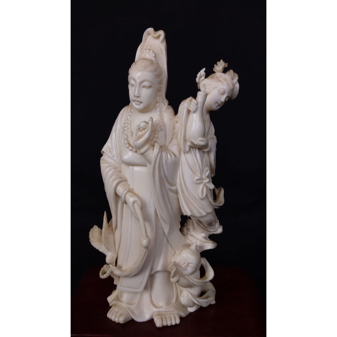 Finely Carved Chinese Kwan Yin Figure: Finely Carved Chinese Kwan Yin Figure. Measures 14cm tall. Please carefully read our terms of sale, shipping information, and request any condition reports or photos prior to placing a bid. Any condit