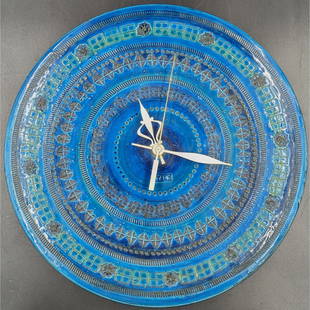 Howard Miller Mid-Century Aldo Londi Bitossi Rimini Blue Ceramic Meridian Wall Clock: Howard Miller Mid-Century Aldo Londi Bitossi Rimini Blue Ceramic Meridian Wall Clock. Measures approx. 14 1/2" in diameter. In perfect cosmetic and operating condition, but please note the clock hands