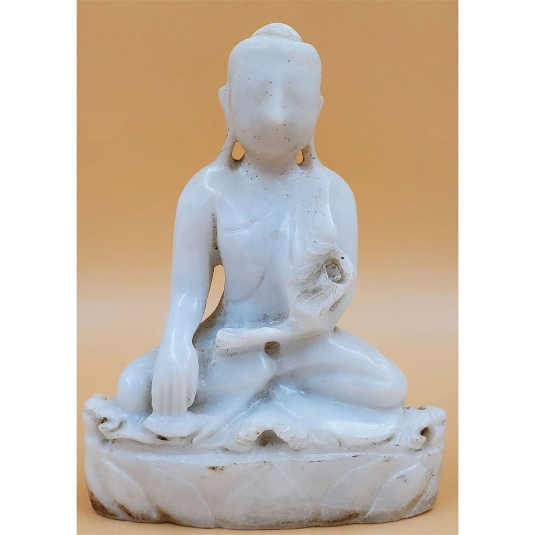 Antique Burmese Carved Alabaster Seated Buddha: Antique Burmese Carved Alabaster Seated Buddha. Measures 5 7/8" x 2 3/8" x 7 5/8". || Please carefully read our terms of sale, shipping information, and request any condition reports or photos prior t