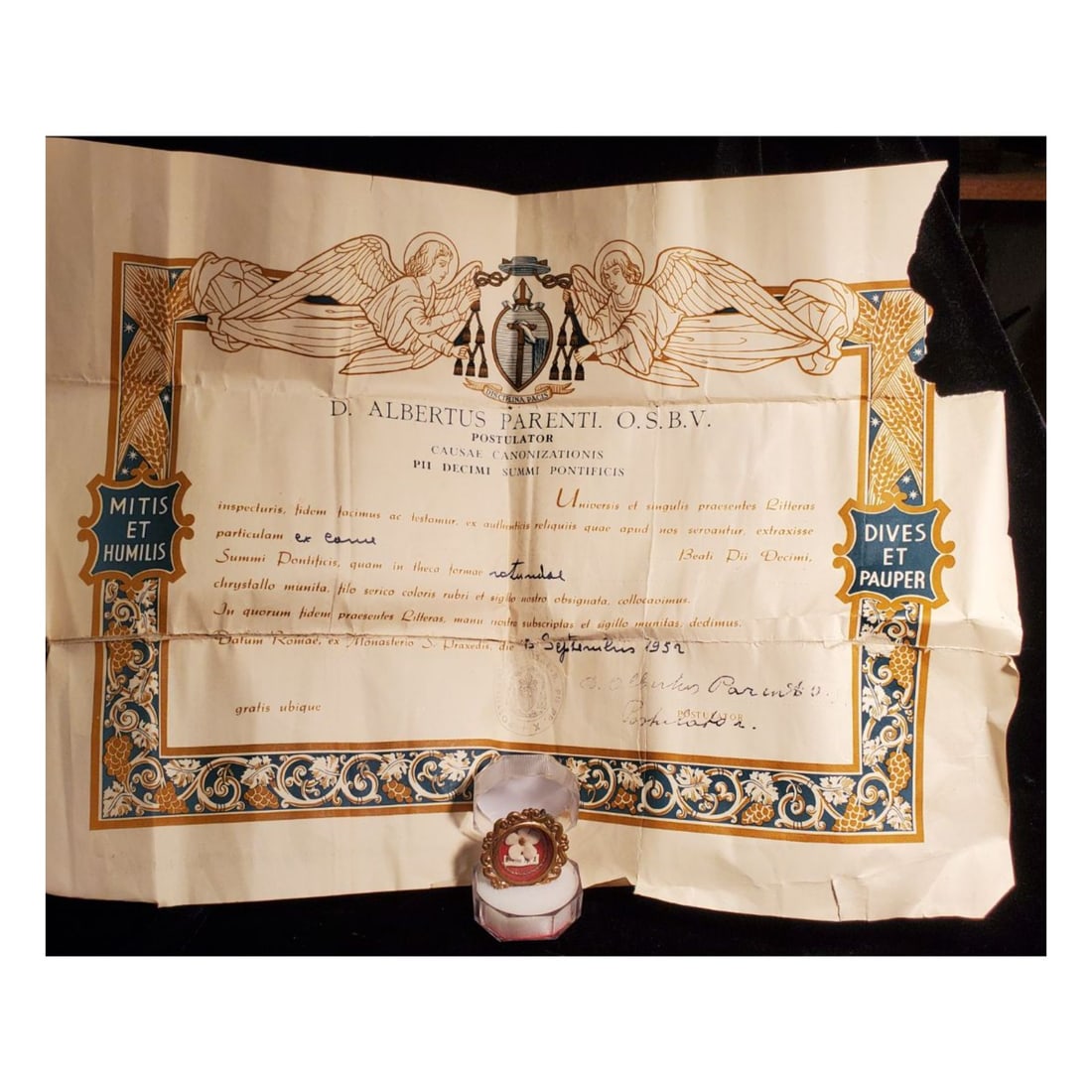 1st Class Relic Of Blessed Pius X With Authentication Document Dated 1952: 1st class relic of Blessed Pius X with authentication document dated 1952. The relic is ex carne, (skin), and contained in a fancy gold theca. The theca is housed in a Gothic type acrylic presentation