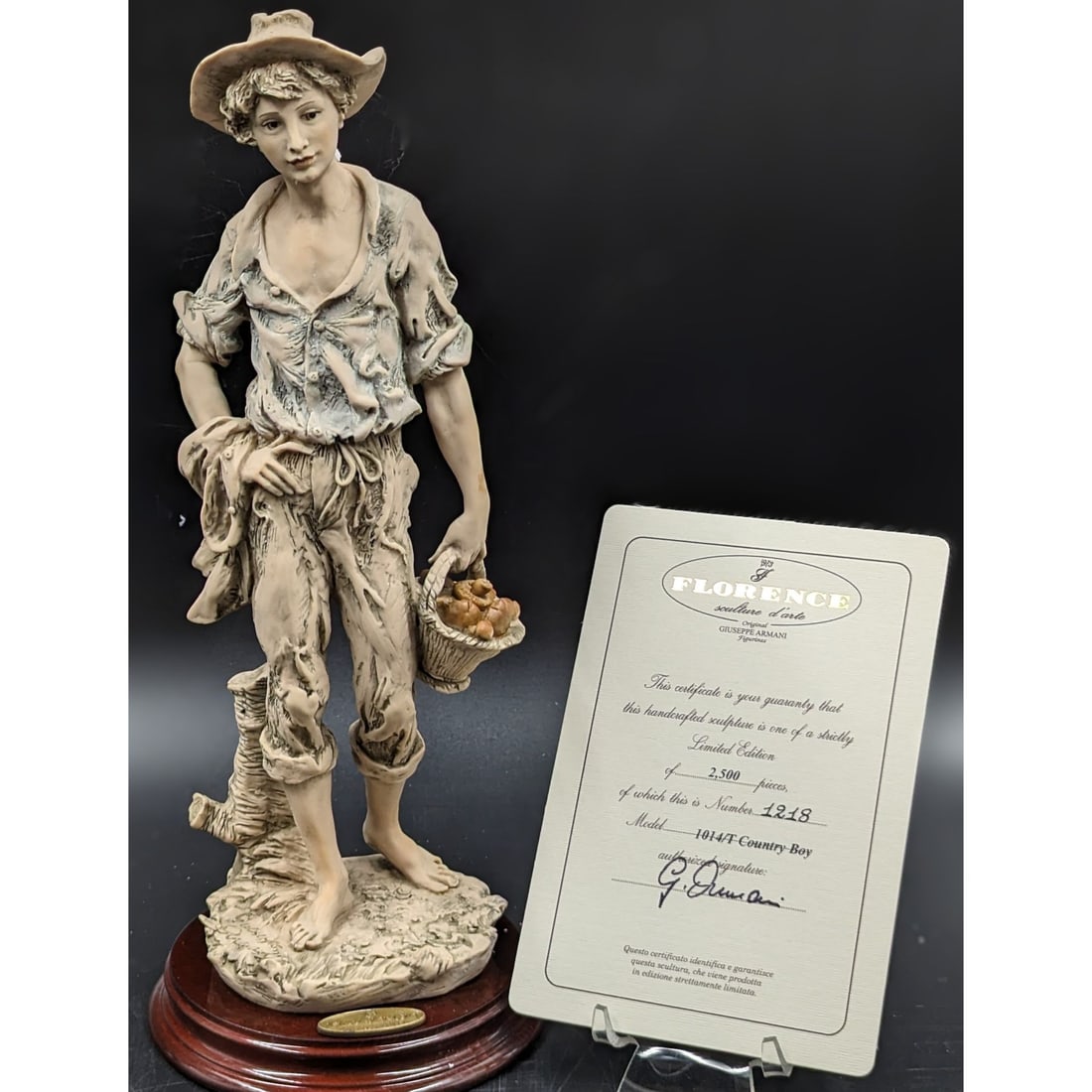 Giuseppe Armani Figurine: Limited Ed. 1218/2500 "Country Boy" 1014T With Original Box And COA: Giuseppe Armani Figurine: Limited Ed. 1218/2500 "Country Boy" 1014T With Original Box And COA. Measures approx. 12" X 5". Please note you can choose not to keep the box, as there is a lot of wear and 