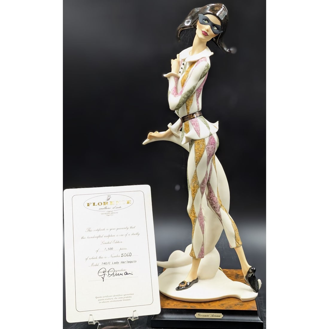 Giuseppe Armani Figurine: Limited Ed 5060 / 7500 "Lady Harlequin" 740C With Original Box And COA: Giuseppe Armani Figurine: Limited Ed 5060 / 7500 "Lady Harlequin" 740C With Original Box And COA. Measures approx. 15" X 5" X 5 1/2". Please note that the box does have signs of weathering and/or wate