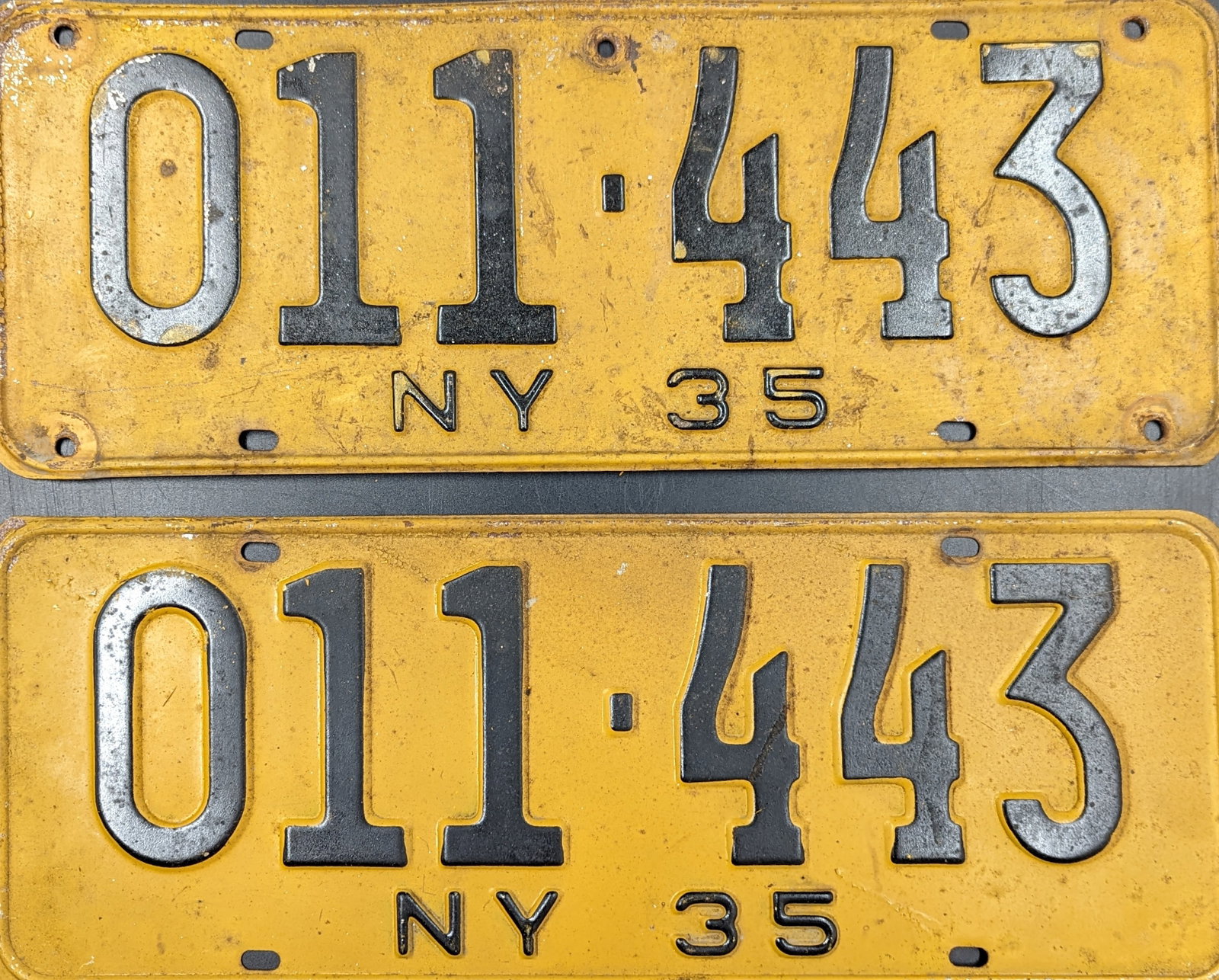 Pair Of Vintage New York License Plates, 1935: Pair Of Vintage New York License Plates, 1935. Measures approx. 6" X 16". || Please carefully read our terms of sale, shipping information, and request any condition reports or photos prior to placing