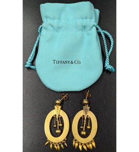 A Pair Of 18K Gold Earrings With Carrying Bag: *** DUE TO THIS LOT BEING GOLD/JEWELRY IT MUST BE PAID VIA BANK WIRE TRANSFER OR CERTIFIED CHECK.*** A Pair Of 18K Gold Earrings With Carrying Bag. The gold was tested in our auction house. || Please