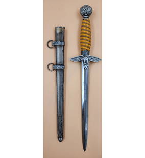 WWII Original German Officer's Dagger: *** DUE TO THIS LOT BEING CLASSED AS A WEAPON IT MUST BE PAID VIA BANK WIRE TRANSFER OR CERTIFIED CHECK.*** WWII Original German Officer's Dagger. Measure 16 3/4" Overall In Sheath, Blade 9 1/4".|| Pr