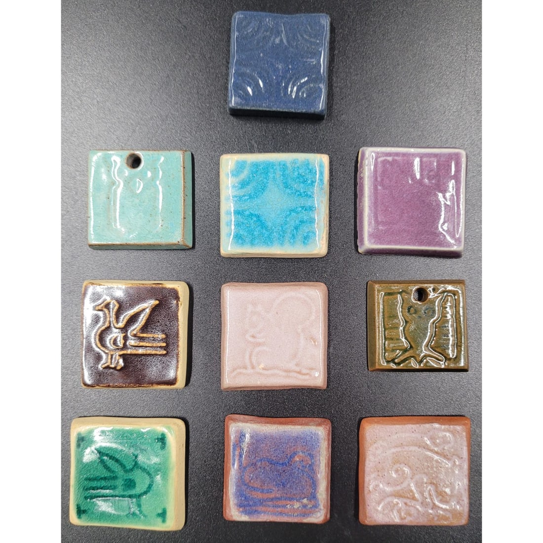 10 Trial Glaze Or Student Tiles University Of North Dakota School Of Mines: 10 Trial Glaze Or Student Tiles University Of North Dakota School Of Mines. Each average about 1-3/8" square. Most have the U.N.D. mark, but most base marking have either inked glaze details or inscri