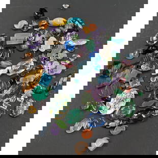 A Grouping Of Faceted Jewelers Gemstones, 80 Grams: *** DUE TO THIS LOT BEING GEMS IT MUST BE PAID VIA BANK WIRE TRANSFER OR CERTIFIED CHECK.*** A Grouping Of Faceted Jewelers Gemstones, 80 Grams. Please note that we have not tested any of these gemsto