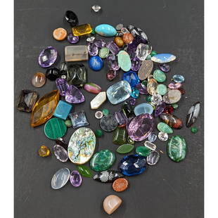 A Grouping Of Faceted Jewelers Gemstones, 80 Grams: *** DUE TO THIS LOT BEING GEMS IT MUST BE PAID VIA BANK WIRE TRANSFER OR CERTIFIED CHECK.*** A Grouping Of Faceted Jewelers Gemstones, 80 Grams. Please note that we have not tested any of these