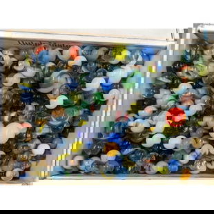 A Large Collection Of Vintage Glass Marbles: A Large Collection Of Vintage Glass Marbles. || Please carefully read our terms of sale, shipping information, and request any condition reports or photos prior to placing a bid. Any condition stateme