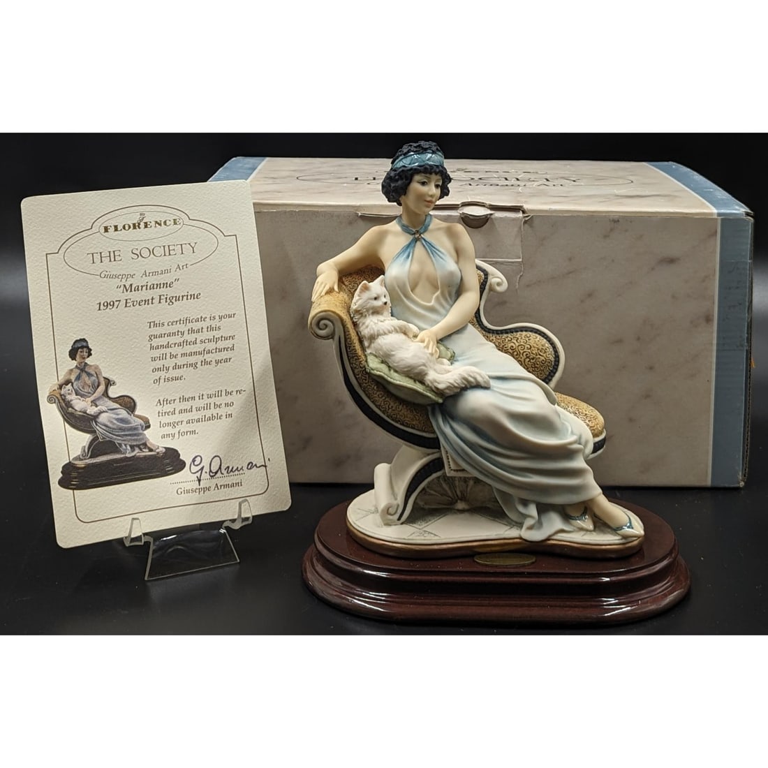 Giuseppe Armani Figurine: Limited Ed. 1997 Event Figurine "Marianne", Signed Attilio Vezoosi, W/ COA: Giuseppe Armani Figurine: Limited Ed. 1997 Event Figurine "Marianne" 135C, Signed Attilio Vezoosi, W/ COA And Original Box. Measures approx. 7 3/4" X 4" X 6 1/4". || Please carefully read our terms of