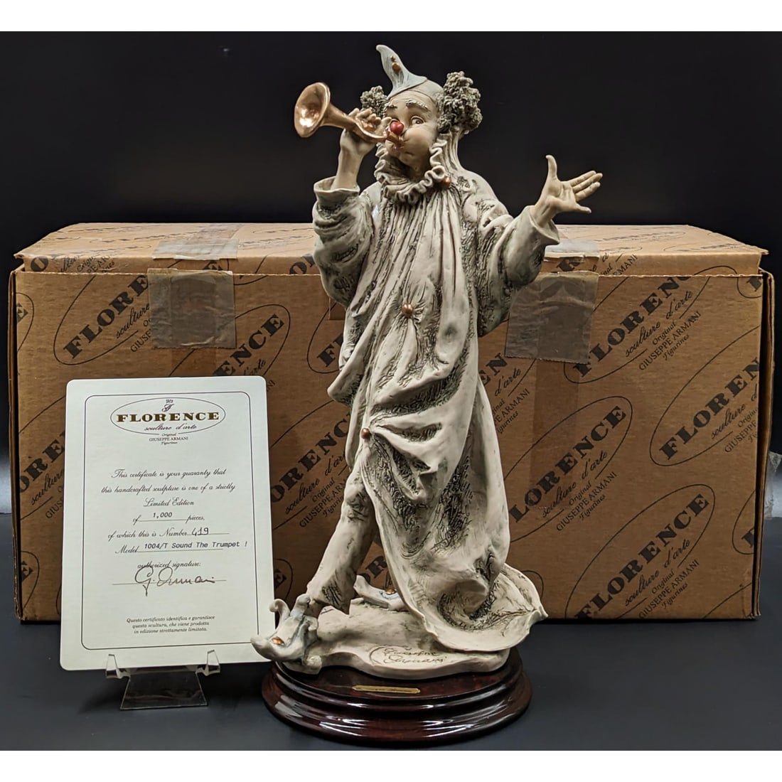 Giuseppe Armani Figurine: Limited Ed. 619/1000 "Sound The Trumpet!" 1004/T With COA And Box: Giuseppe Armani Figurine: Limited Ed. 619/1000 "Sound The Trumpet!" 1004/T With COA And Box. Measures approx. 13 1/4" X 6 1/2". || Please carefully read our terms of sale, shipping information, and re