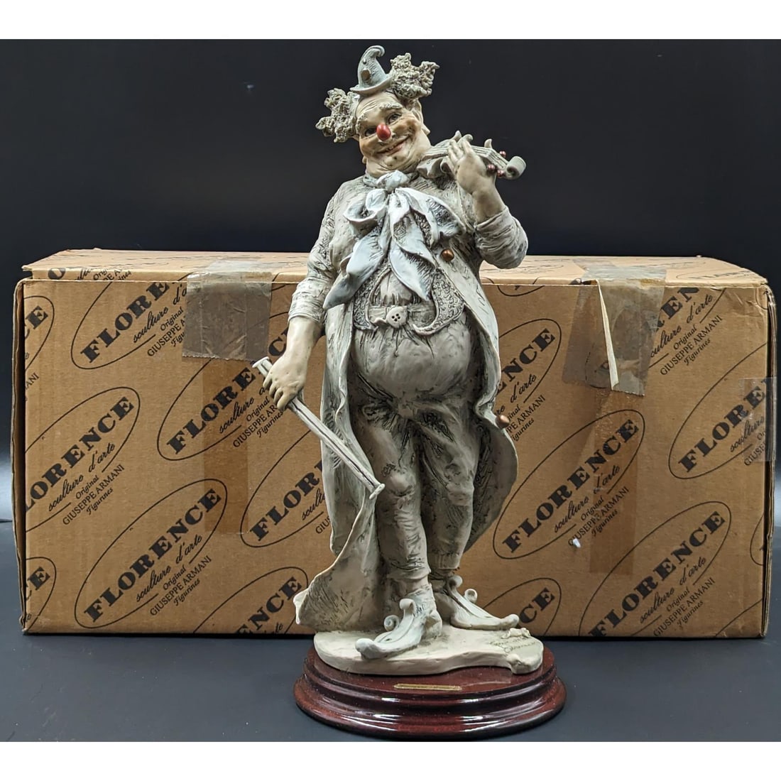 Giuseppe Armani Figurine: Limited Ed. 619/1000 "The Happy Fiddler" 1005T With Original Box: Giuseppe Armani Figurine: Limited Ed. 619/1000 "The Happy Fiddler" 1005T With Original Box. Measures approx. 13 1/2" X 5 1/2". || Please carefully read our terms of sale, shipping information, and req